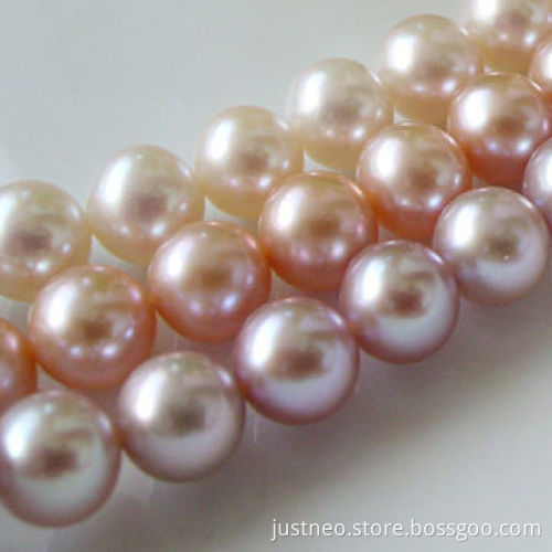 Freshwater round pearl strand, available in pink and white